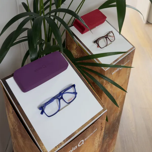 Frames and cases on a display plinth