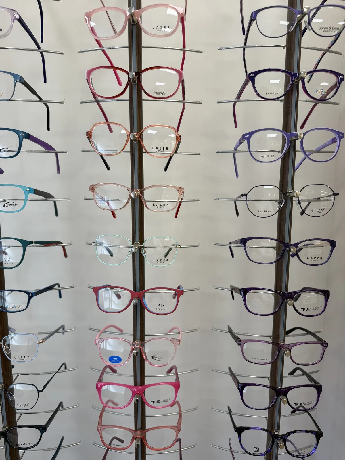 A rack of colourful frames at Norfolk Opticians