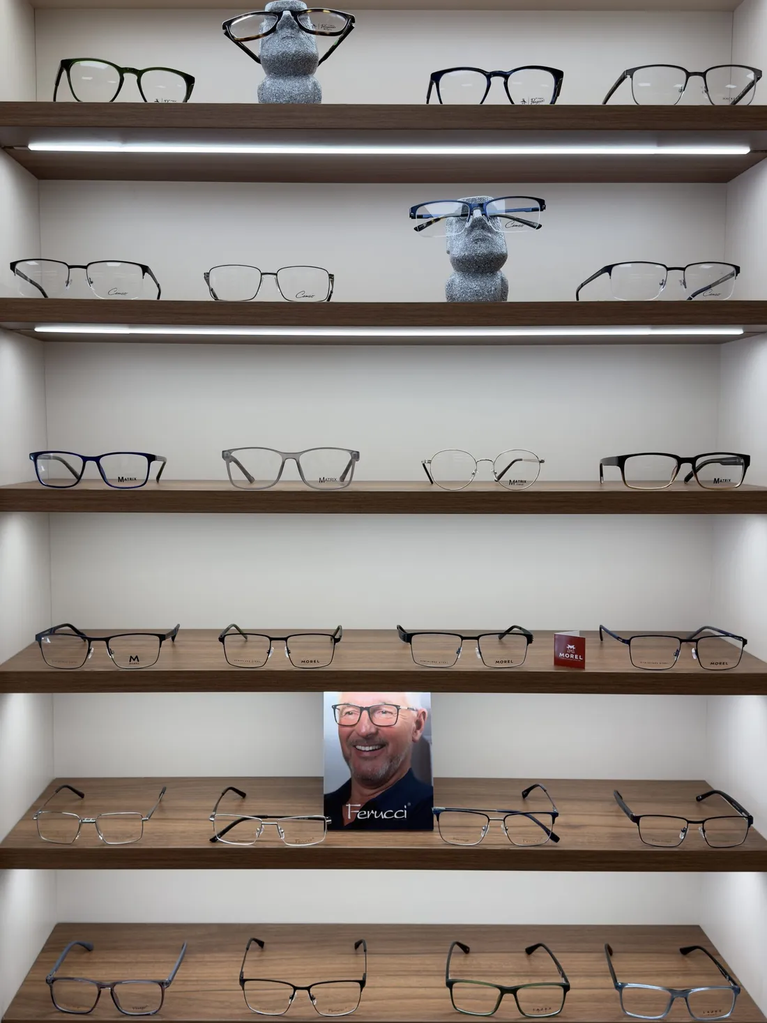 Frames on the lit display shelves